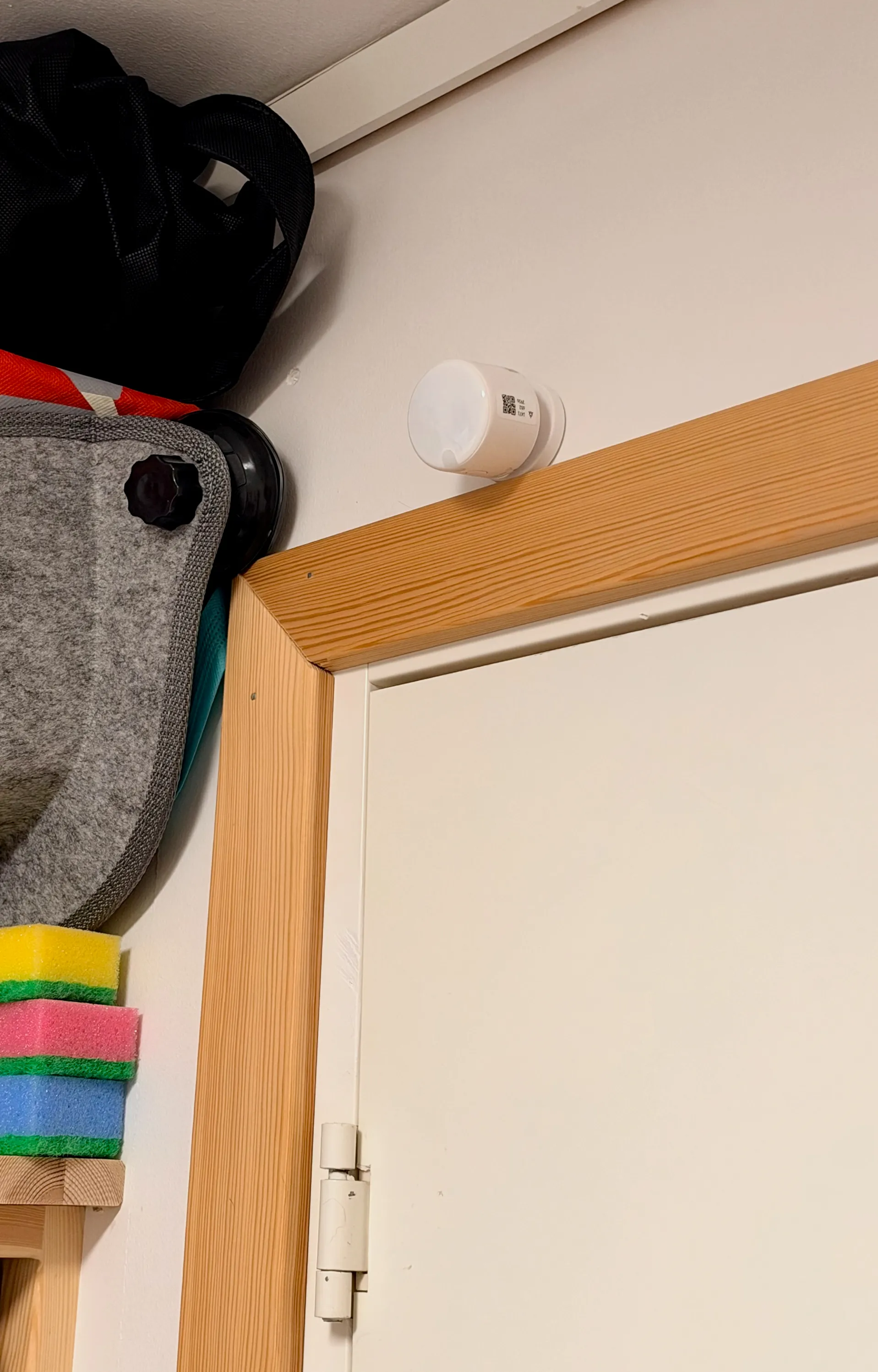 LED light fixture on the left, Aqara light switch in the middle, and Aqara presence sensor on the right